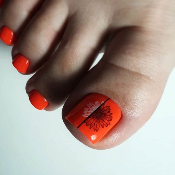 Ярко-оранжевый весенний педикюр с рисунками